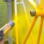 Powder-Coating-Action-Yellow-Bike-Frame.jpg